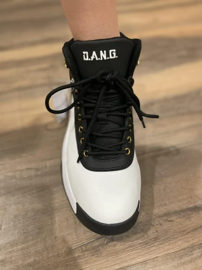 front view of the black and white shoes